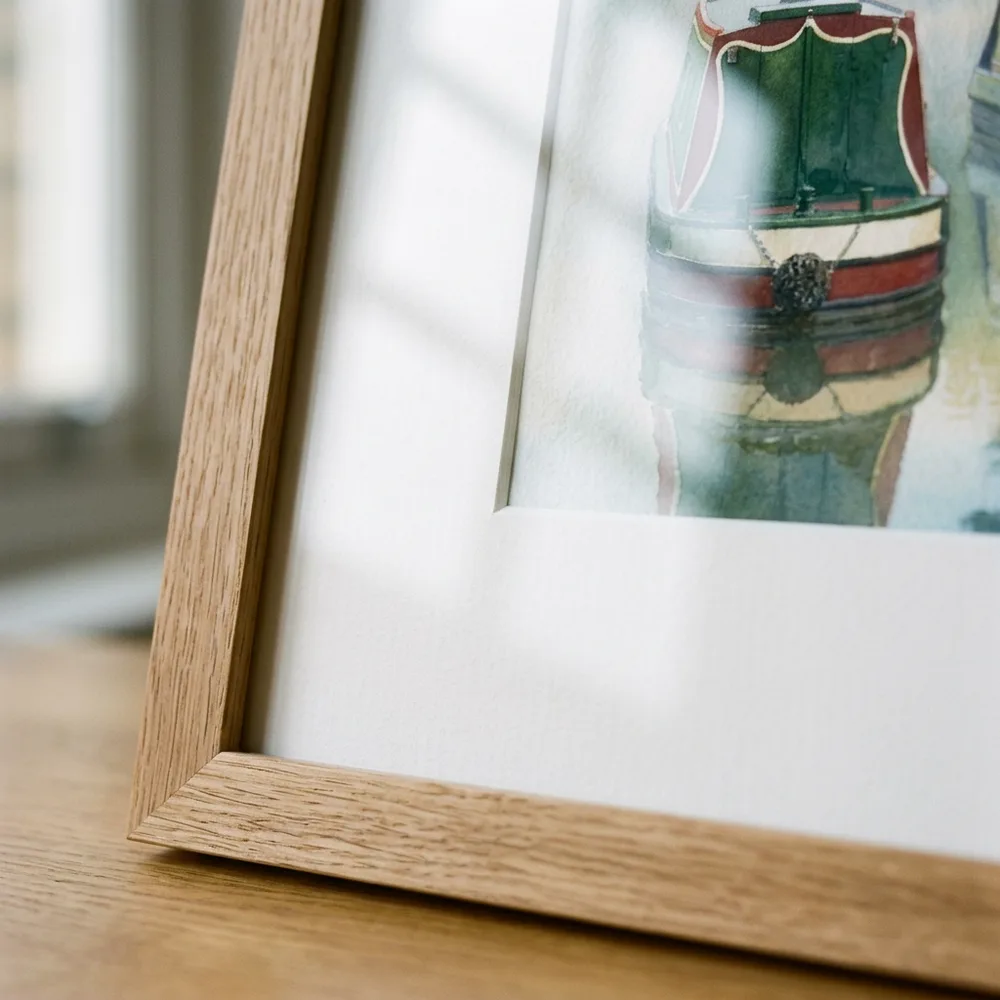 Mitred corner of a natural wood frame